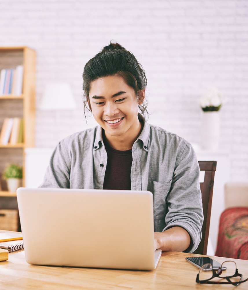 An Ask Velma virtual medical assistant at his home desk